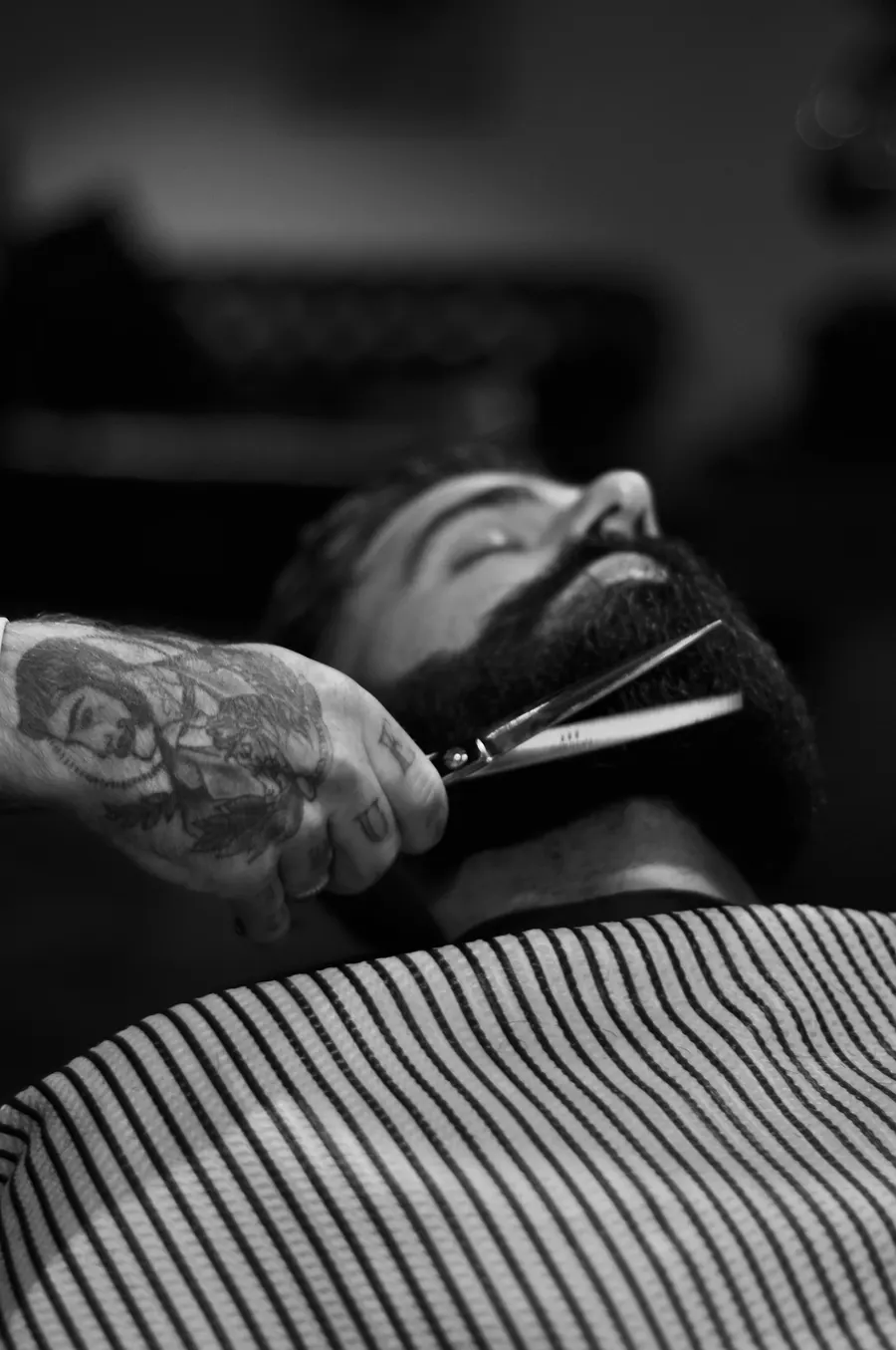 Straight-razor beard shave in progress